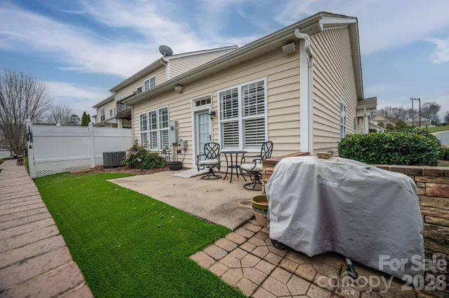 a house view with a garden space