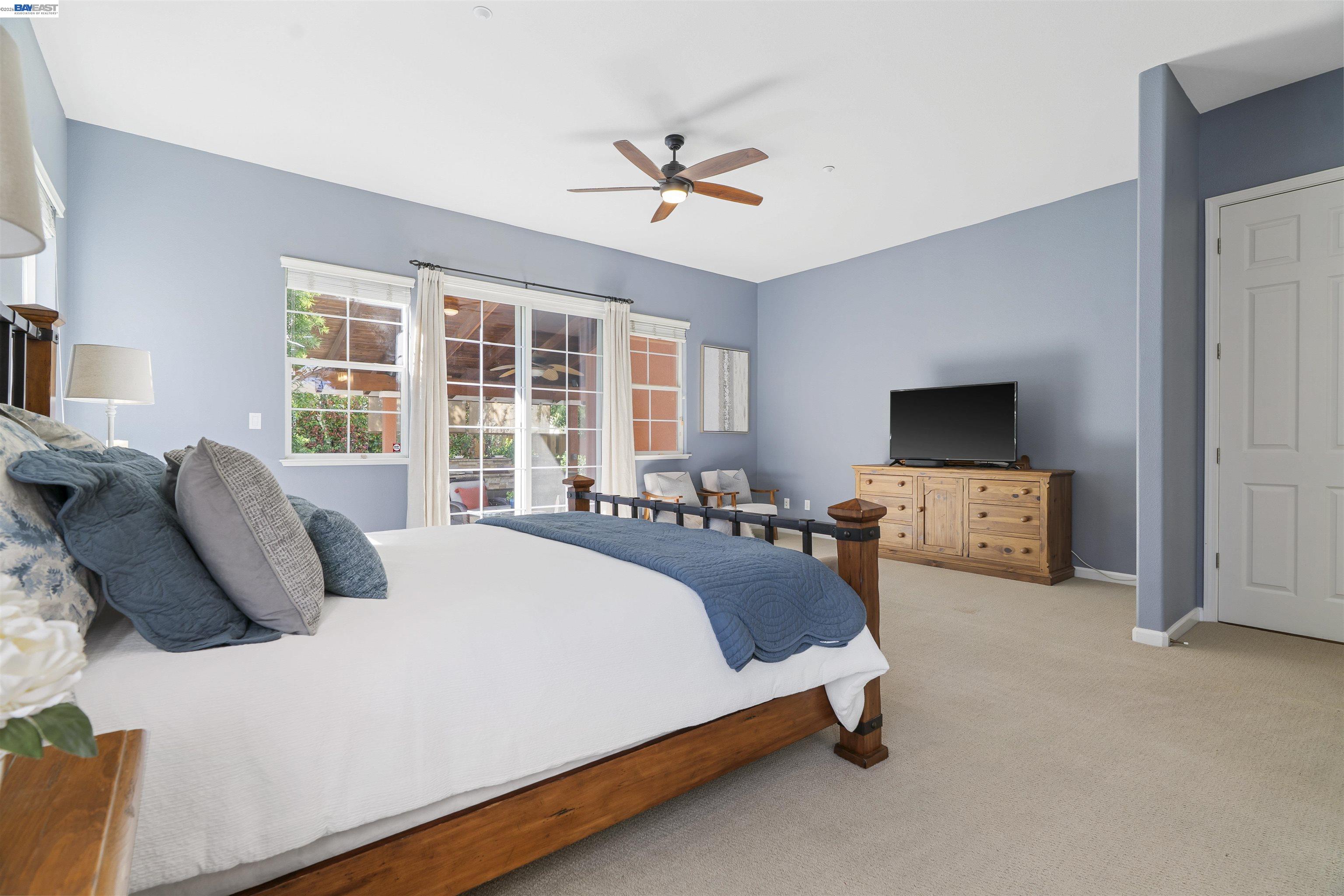 1635 Embassy Circle Livermore, CA 94550 - Photo 16 of 60 a bed room with a bed and a couch