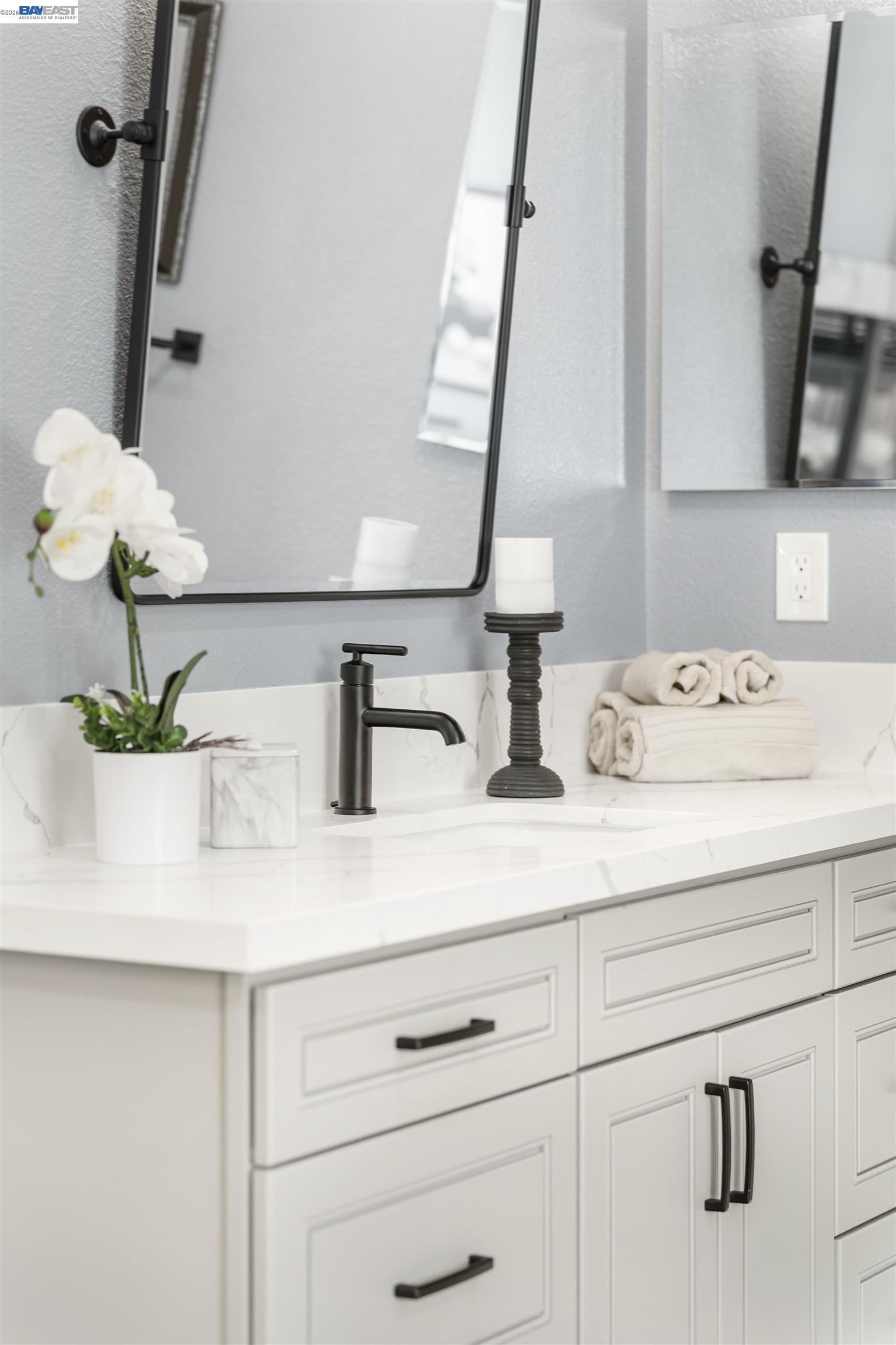 1635 Embassy Circle Livermore, CA 94550 - Photo 20 of 60 a bathroom with a sink and a mirror
