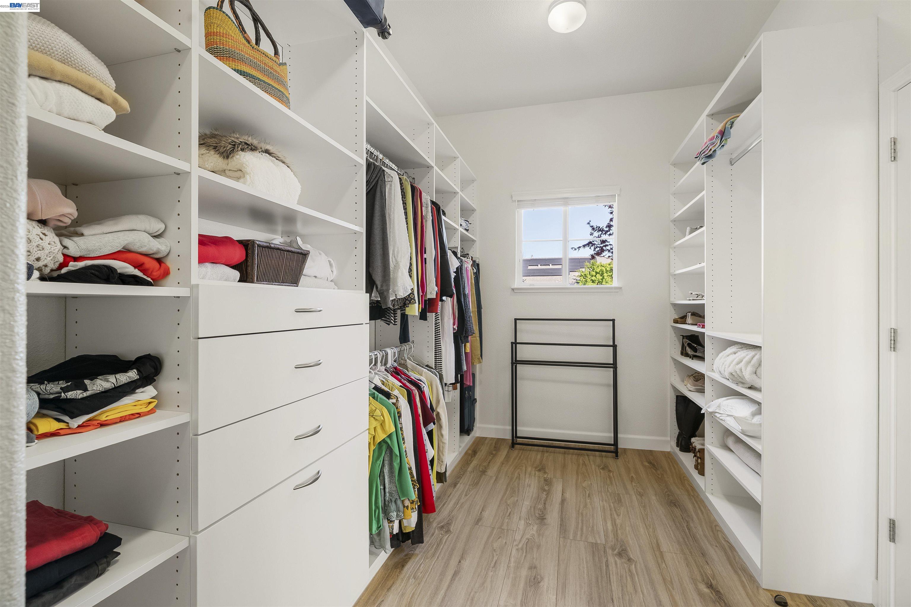 1635 Embassy Circle Livermore, CA 94550 - Photo 25 of 60 a view of walk in closet with clothes and shoes