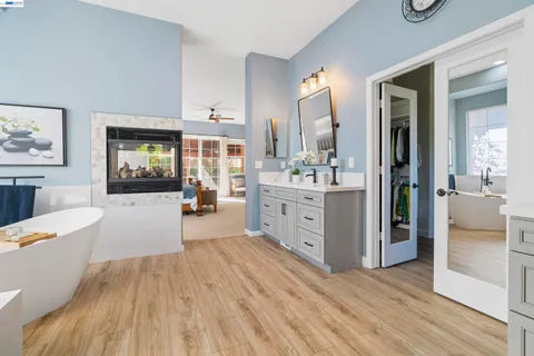 a view of living room with furniture and flat screen tv
