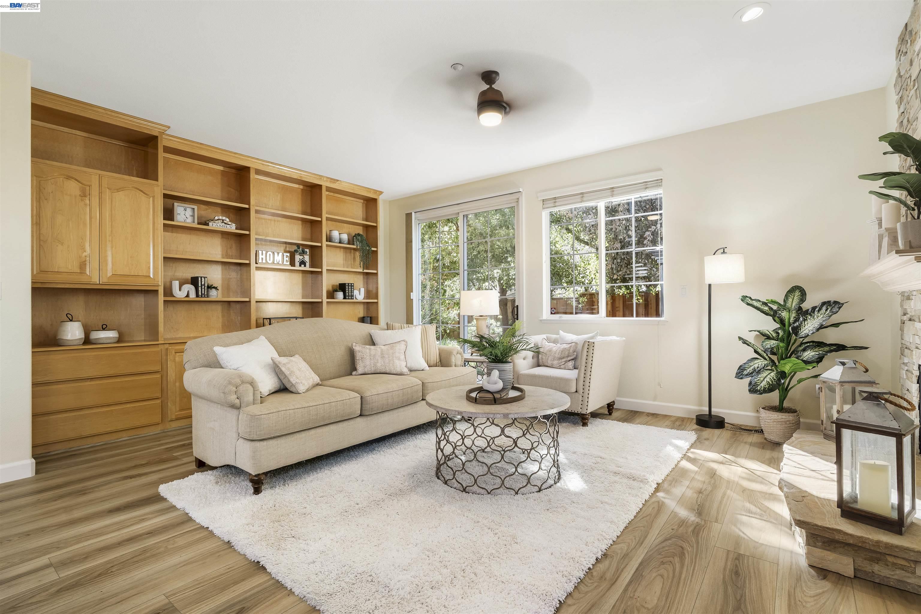 1635 Embassy Circle Livermore, CA 94550 - Photo 31 of 60 a living room with furniture and a large window