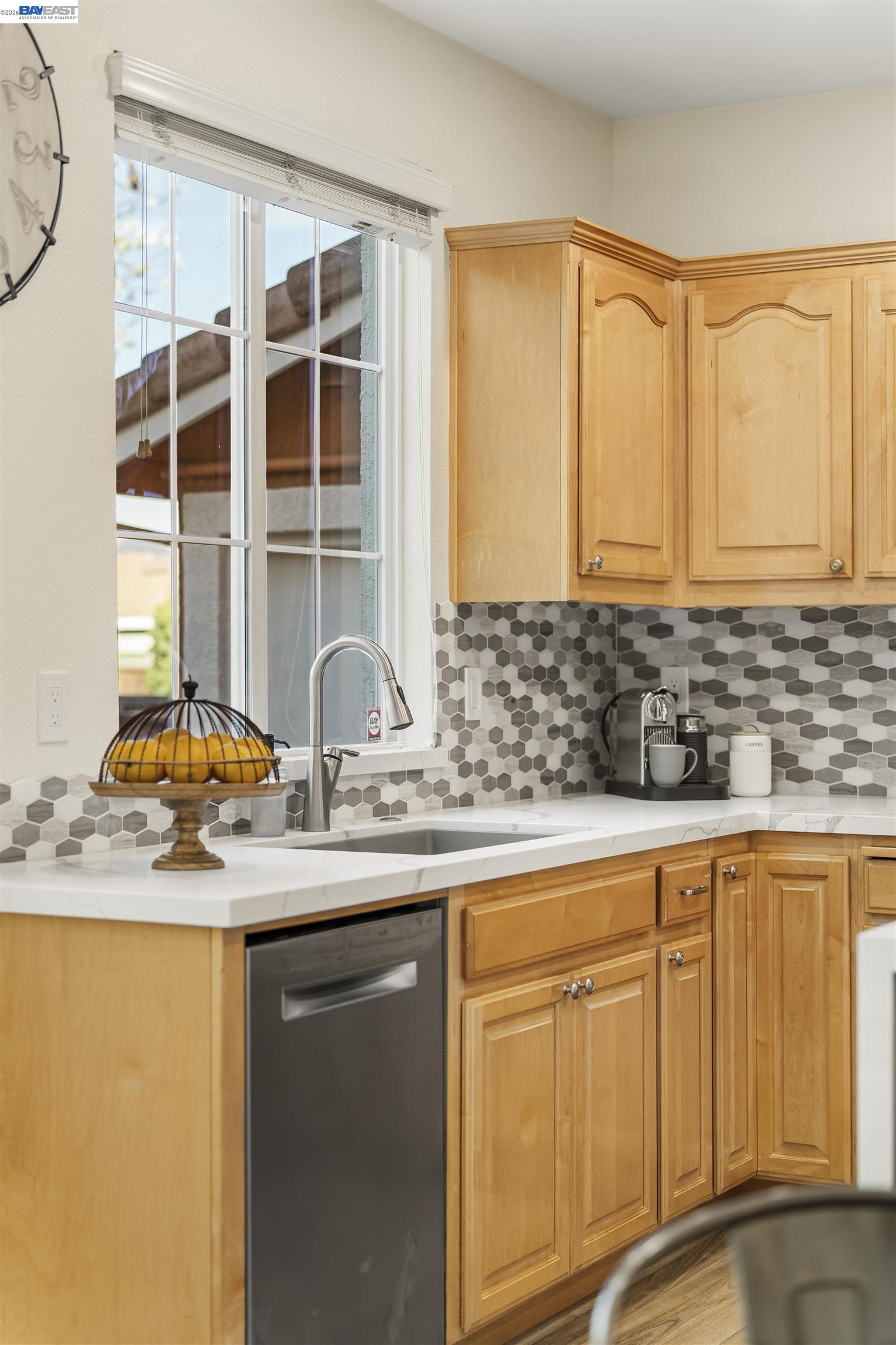 1635 Embassy Circle Livermore, CA 94550 - Photo 35 of 60 a kitchen with stainless steel appliances granite countertop a sink and a window