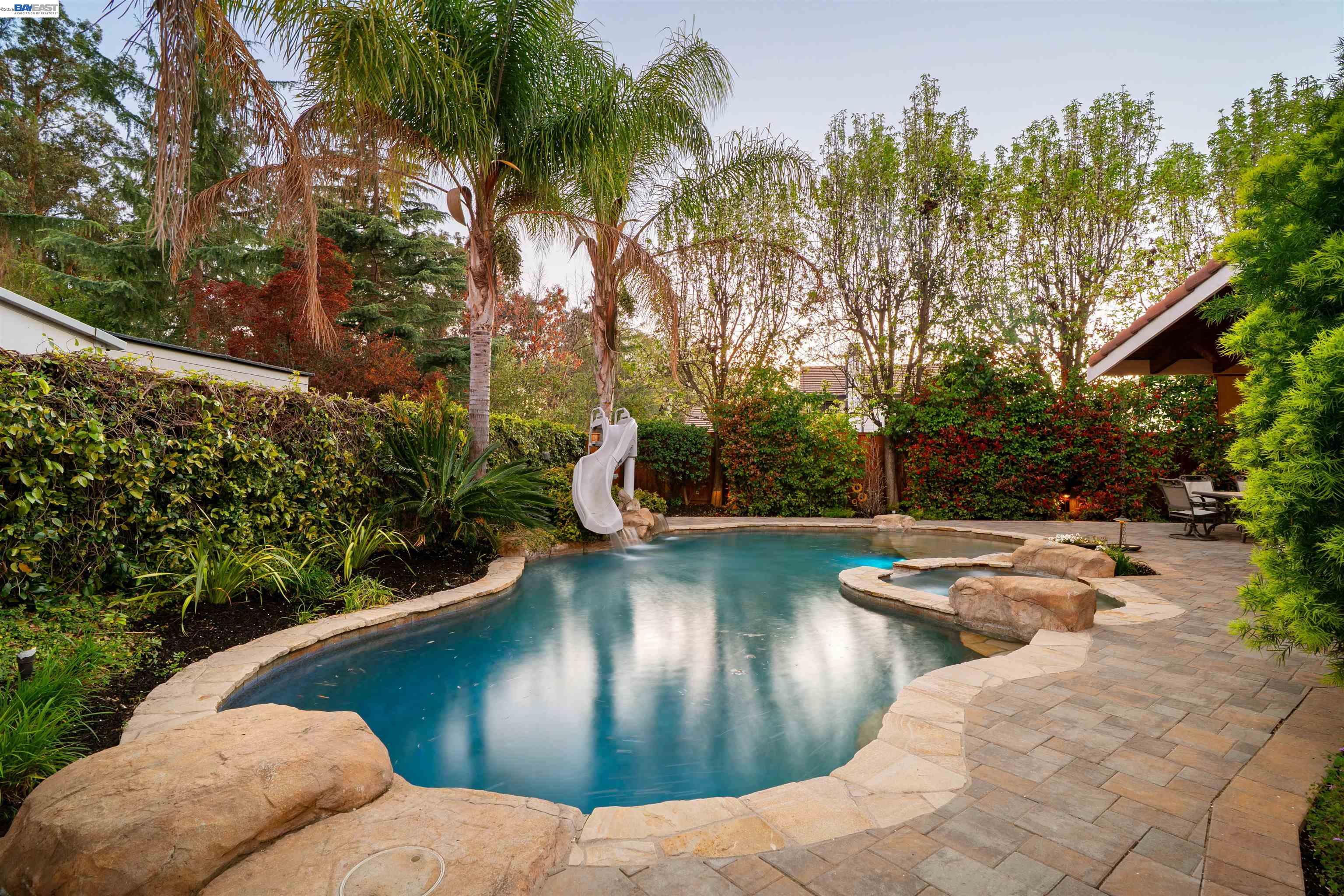 1635 Embassy Circle Livermore, CA 94550 - Photo 48 of 60 a view of a swimming pool with a patio