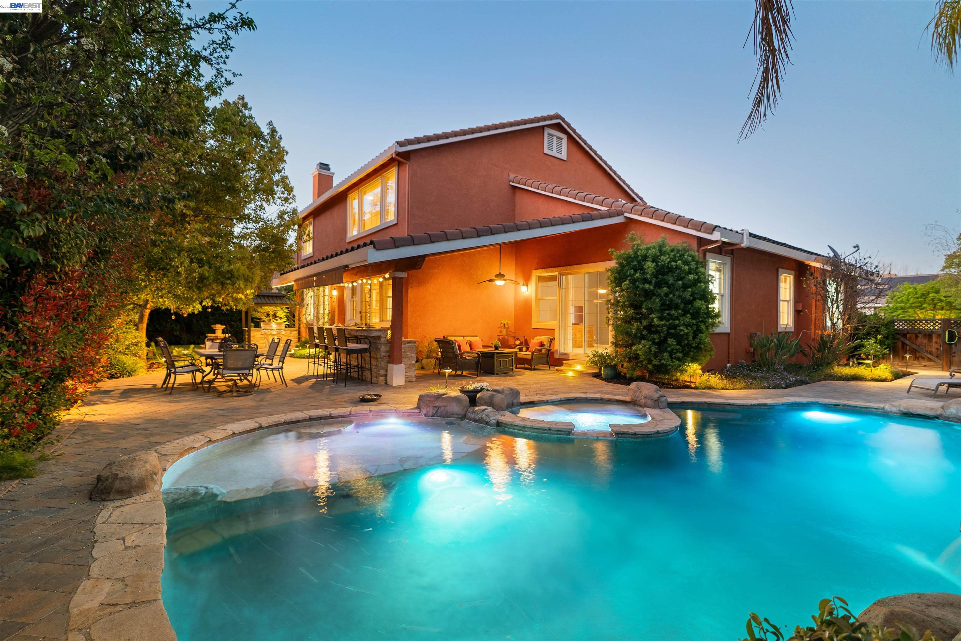 1635 Embassy Circle Livermore, CA 94550 - Photo 50 of 60 a view of pool with lawn chairs and plants