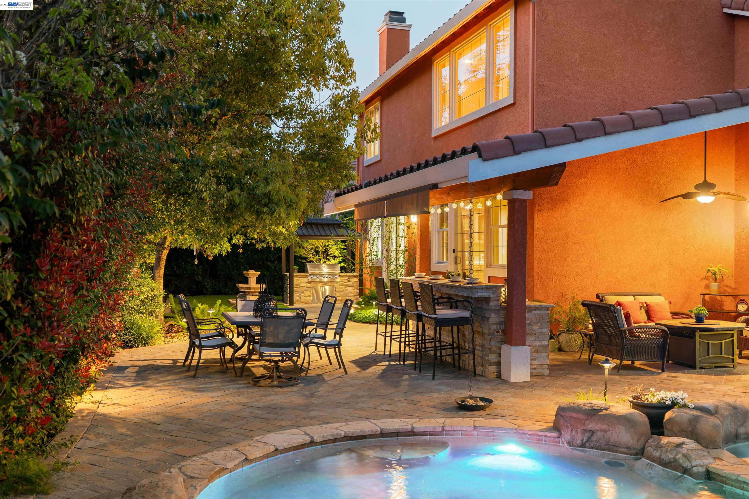 1635 Embassy Circle Livermore, CA 94550 - Photo 52 of 60 a view of a swimming pool with outdoor seating