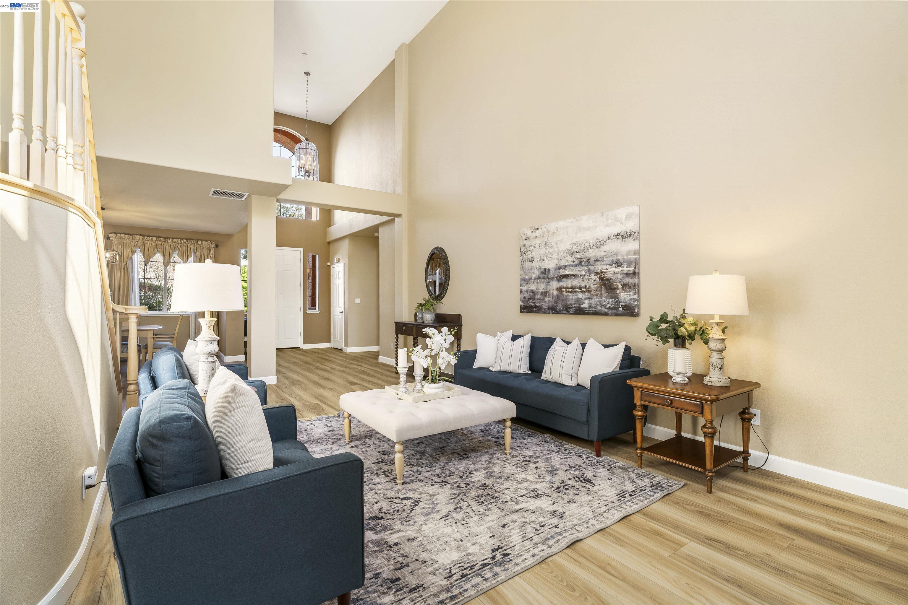 1635 Embassy Circle Livermore, CA 94550 - Photo 9 of 60 a living room with furniture and a large window