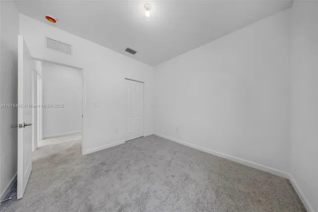 a view of a yard with a house