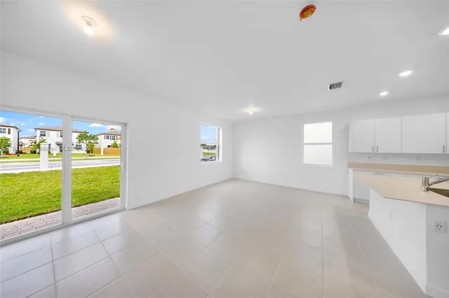 an empty room with windows