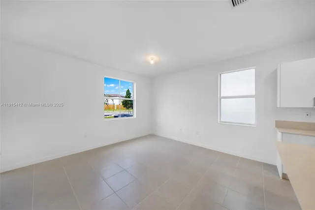 a view of an empty room with window