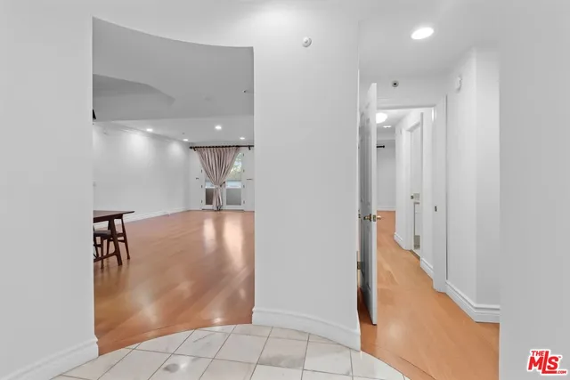 a bedroom with a bed and a table in it