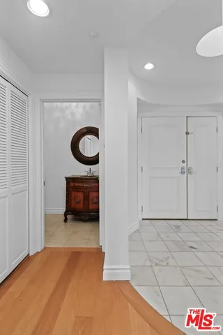 a bathroom with a toilet and a sink