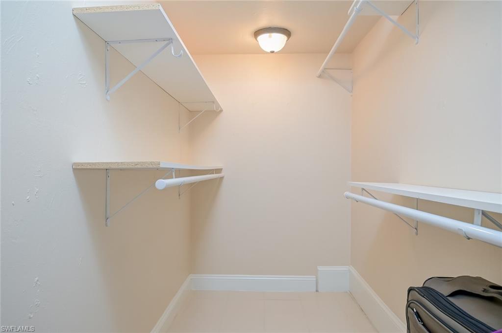 145 Cypress Way East, Unit A Naples, FL 34110 - Photo 14 of 24 a view of storage and utility