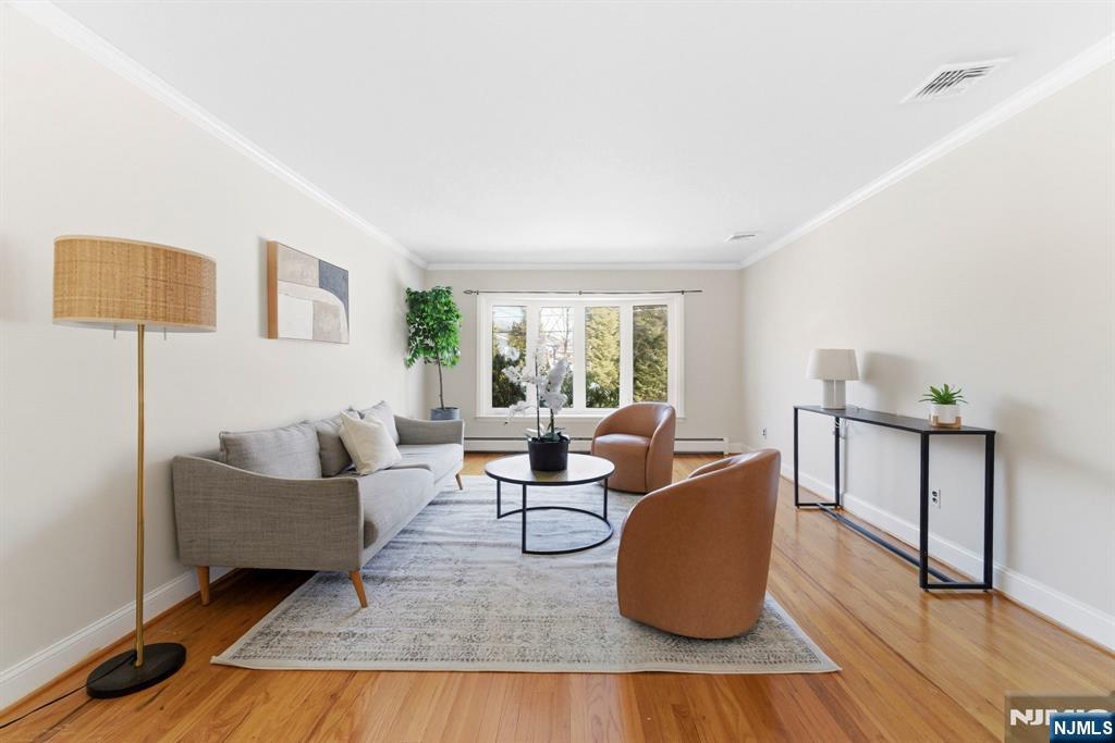 3 Rutgers Court Roseland, NJ 07068 - Photo 13 of 29 a living room with furniture and a window