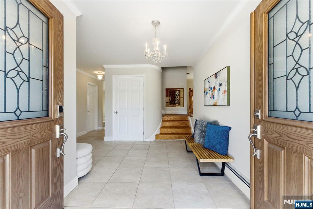 3 Rutgers Court Roseland, NJ 07068 - Photo 2 of 29 a view of entryway with furniture