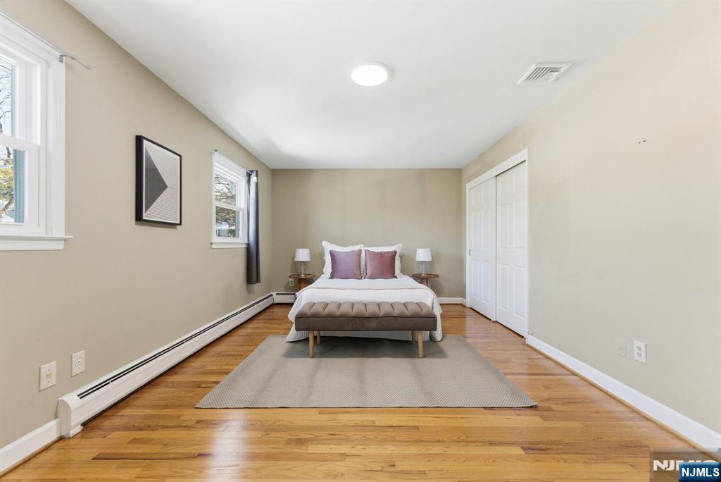 3 Rutgers Court Roseland, NJ 07068 - Photo 21 of 29 a living room with a couch