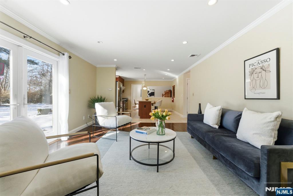 3 Rutgers Court Roseland, NJ 07068 - Photo 6 of 29 a living room with furniture and a large window