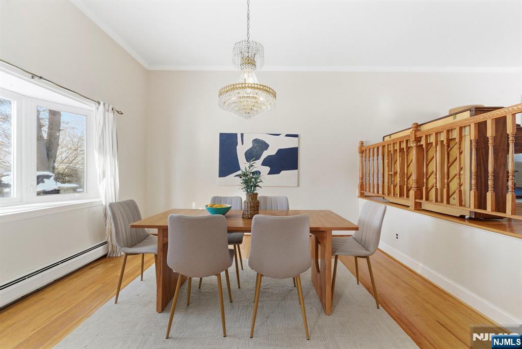 3 Rutgers Court Roseland, NJ 07068 - Photo 10 of 29 a view of a dining room with furniture window and wooden floor