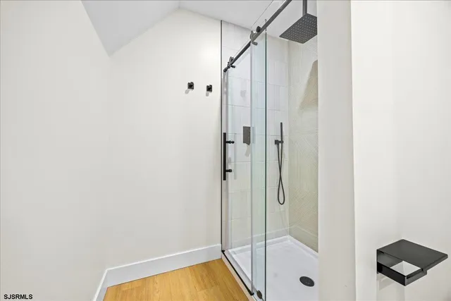 a house view with swimming pool in front of it