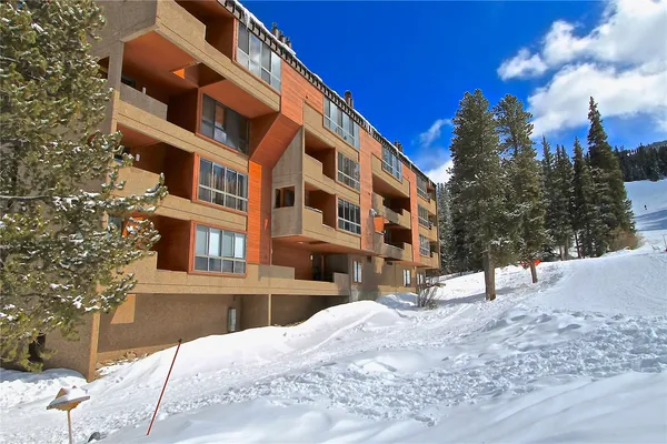 a view of a building with a snow