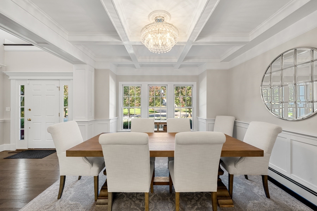 120 Deerfield Lane Hanover, MA 02339 - Photo 15 of 42 a view of a dining room with furniture window and wooden floor
