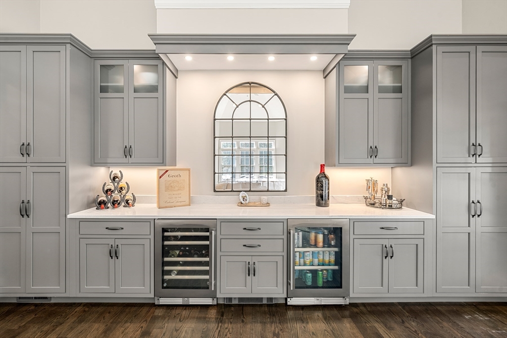 120 Deerfield Lane Hanover, MA 02339 - Photo 19 of 42 a view of cabinets a sink dishwasher and a stove