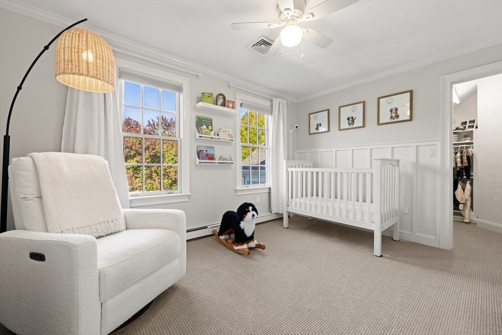 120 Deerfield Lane Hanover, MA 02339 - Photo 32 of 42 a living room with furniture and a window