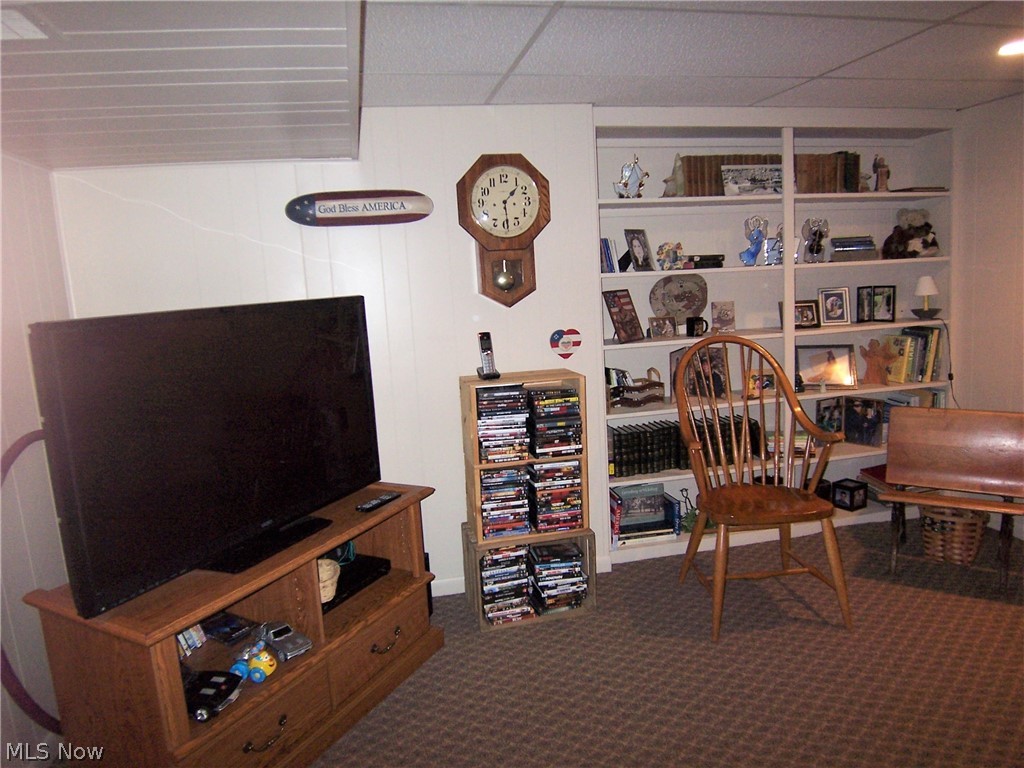 195 Bethel Road Washington, WV 26181 - Photo 23 of 30 Rec room built ins are a perfect place for your library or to display collectibles.