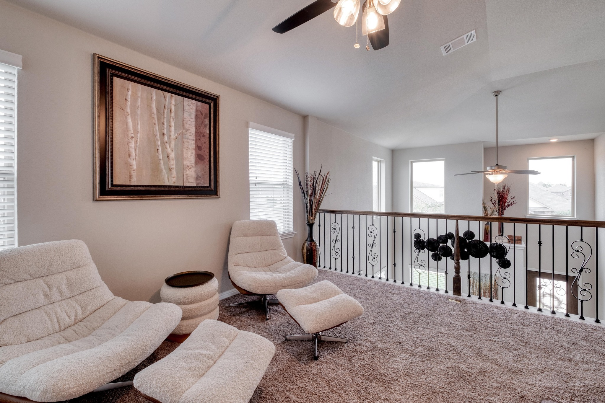 19028 Quebrada Drive Pflugerville, TX 78660 - Photo 3 of 36 a living room with furniture and a large mirror