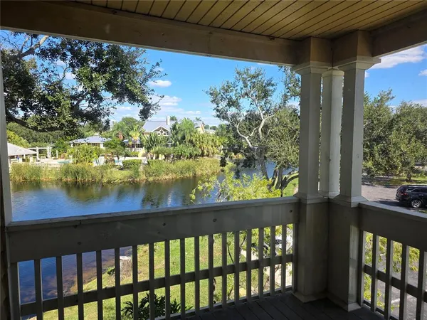 a view of a lake from a balcony