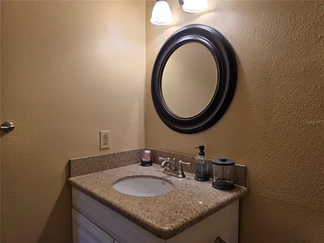 a bathroom with a shower and a tub