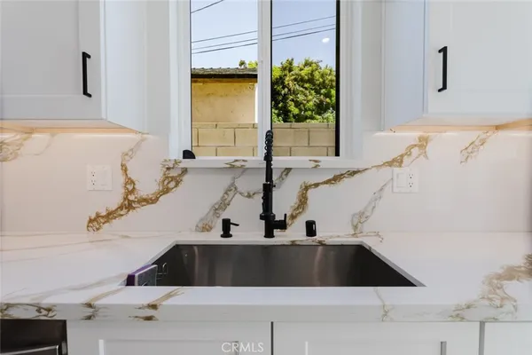 a view of bathroom sink and window