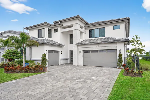 a view of entryway and hall with a front door