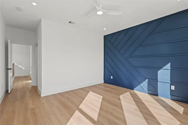 a bedroom with a bed and a view