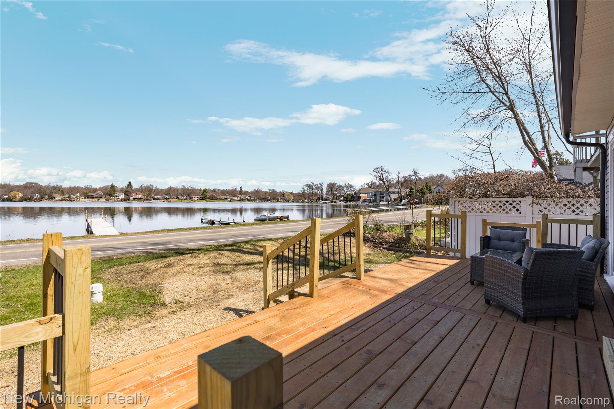 8665 Cooley Lake Road Commerce Township, MI 48382 - Photo 48 of 52 Wooden deck with a water view