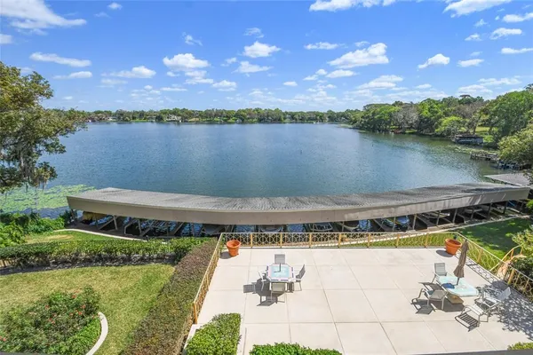 a view of a lake with a yard