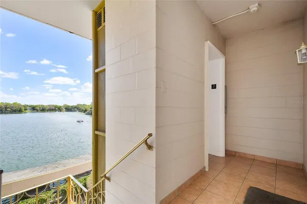 a view of a lake from a balcony