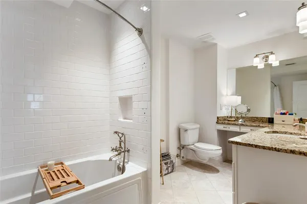 a bedroom with bed and a window