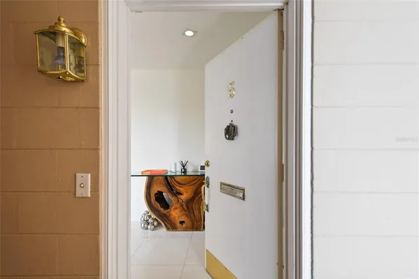 a view of a bathroom with a sink and mirror