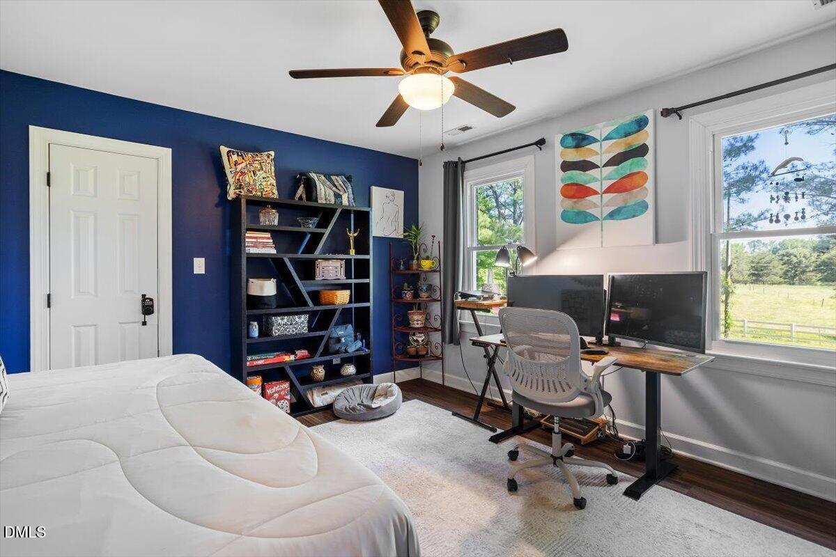 1468 Frazier Road Spring Hope, NC 27882 - Photo 25 of 71 a view of a workspace with furniture and a window