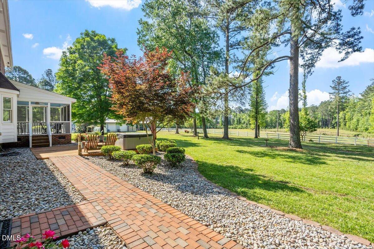 1468 Frazier Road Spring Hope, NC 27882 - Photo 35 of 71 a view of a house with backyard porch and sitting area