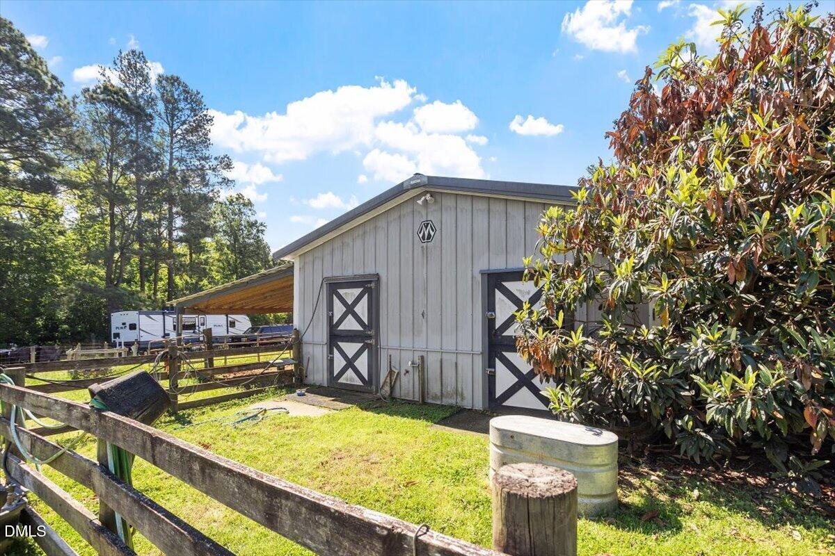 1468 Frazier Road Spring Hope, NC 27882 - Photo 44 of 71 a view of swimming pool with a patio