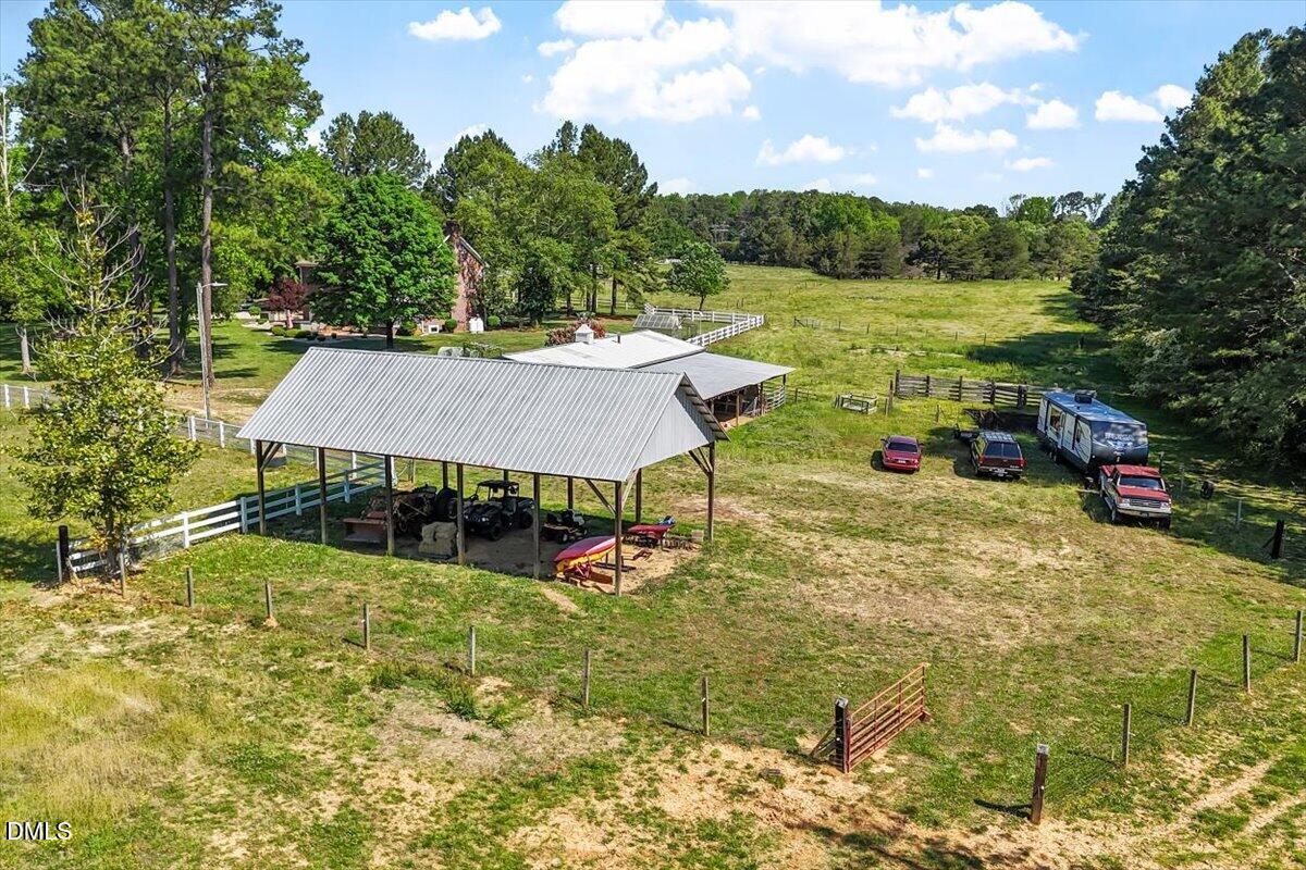1468 Frazier Road Spring Hope, NC 27882 - Photo 51 of 71 a view of a swimming pool with a patio and a yard