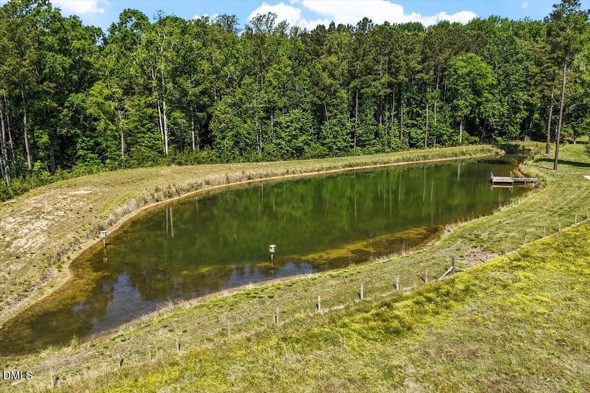 1468 Frazier Road Spring Hope, NC 27882 - Photo 54 of 71 a view of a lake view