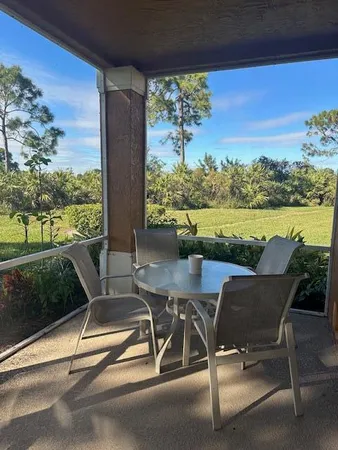a view of yard with patio