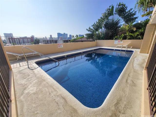 a cars parked in front of a building