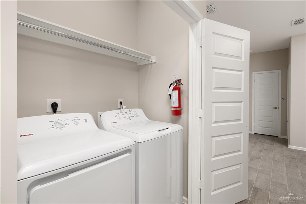 2808 West Harrison Avenue, Unit 4 Alton, TX 78573 - Photo 14 of 22 a utility room with dryer and washer