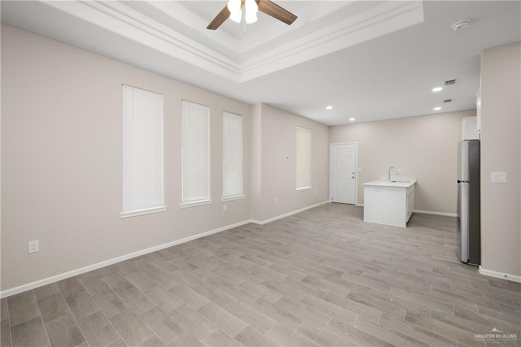 2808 West Harrison Avenue, Unit 4 Alton, TX 78573 - Photo 4 of 22 a view of an empty room with a window