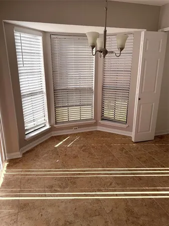 a view of a livingroom with a staircase