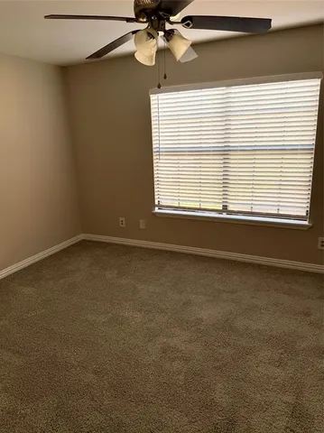 a view of a room that has a window in it